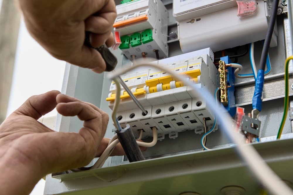 fastening,circuit,breakers,to,din,rail,of,consumer,unit,of